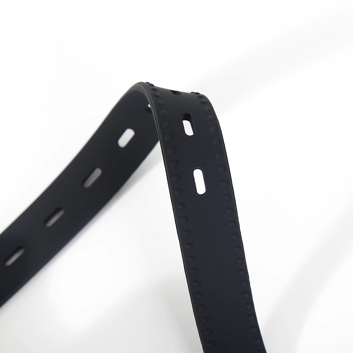 Close-up of silicone O-ring gag strap highlighting soft, flexible material and buckle design