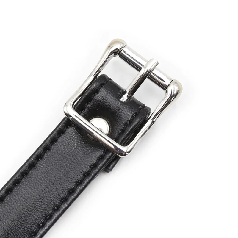 PU leather strap and metal hardware detail of ball gag
