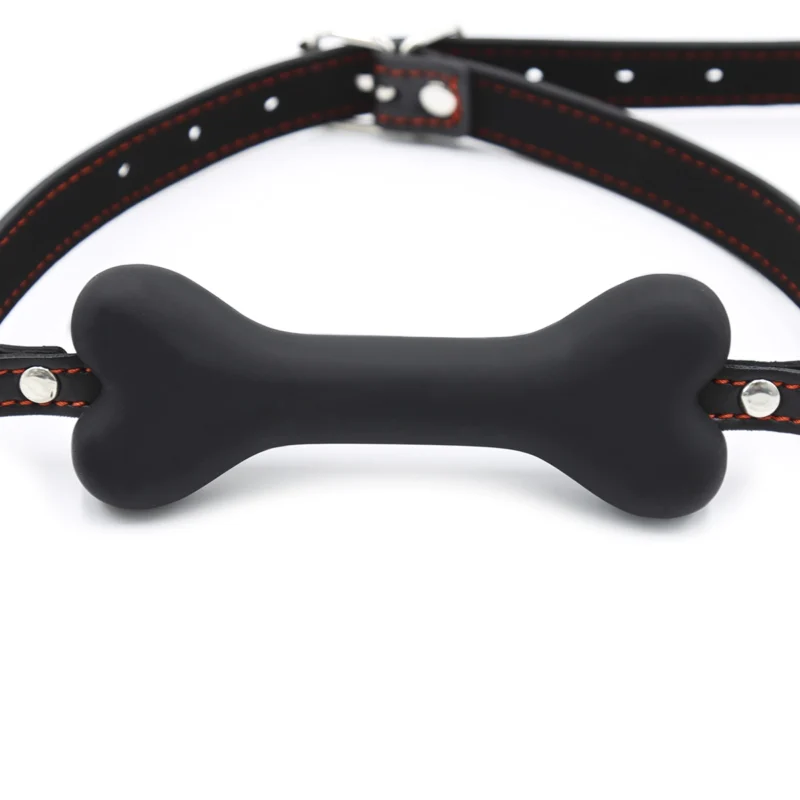 Close-up of smooth bone type silicone mouth gag showing shape and design