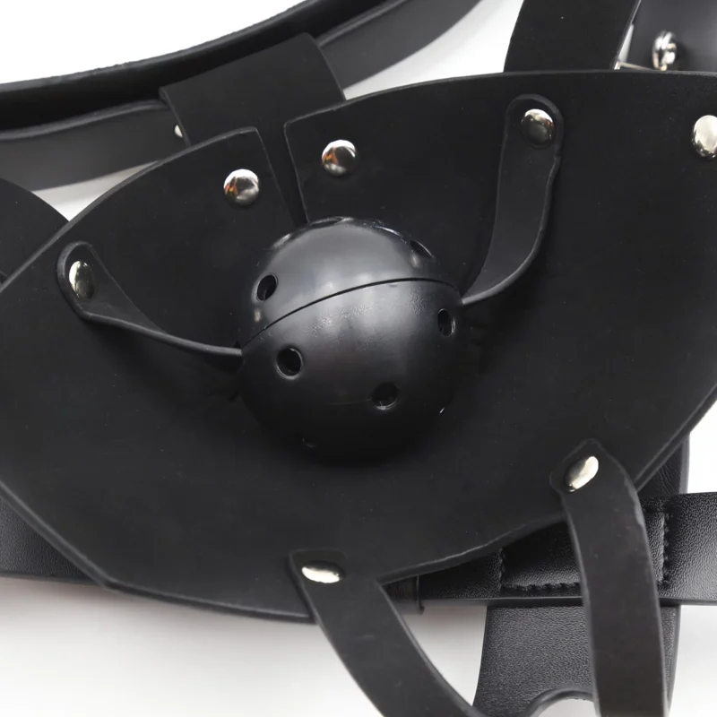 Close-up of 4cm PVC ball gag integrated inside leather mouth mask