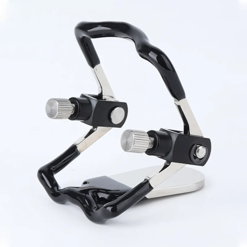 Front-side angled view of metal open mouth gag highlighting overall shape and adjustment mechanism