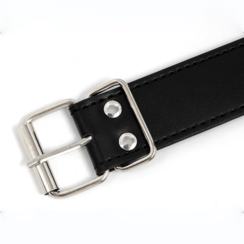 Close-up of metal buckle hardware on PU leather strap