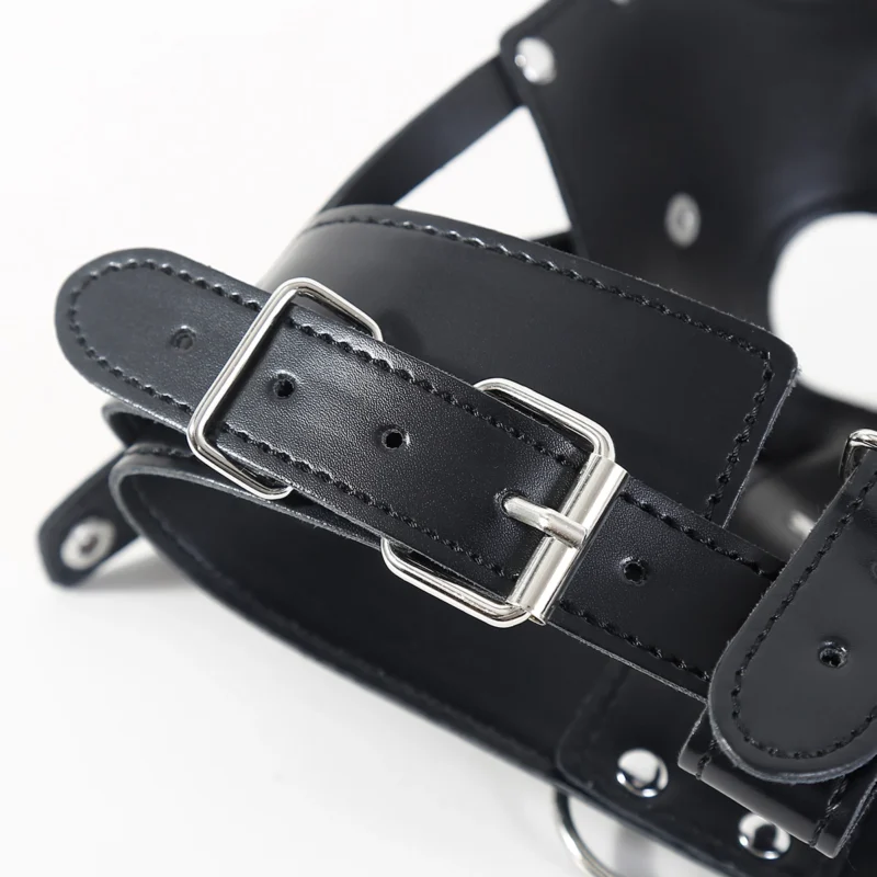 Metal hardware detail of PU leather bondage harness