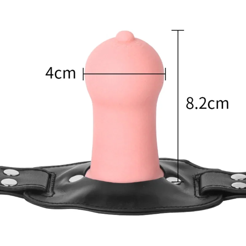 Close-up of nipple-style mouth gag insert with size reference