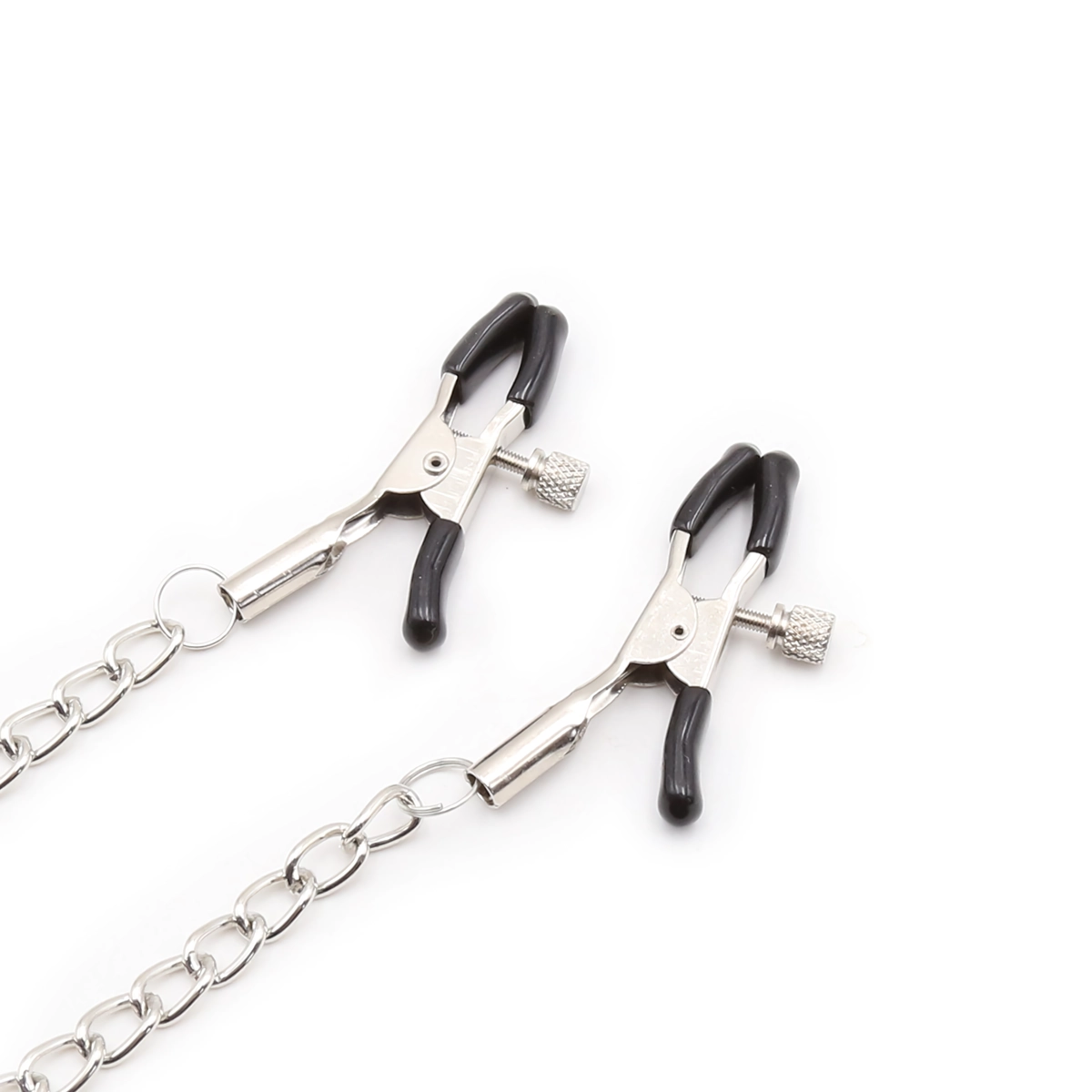 Close-up of adjustable nipple clamps on silicone O-ring mouth gag showing tension mechanism